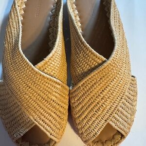 Elegant Tan Woven Espadrilles They are in fantastic condition. 
Priced very low.